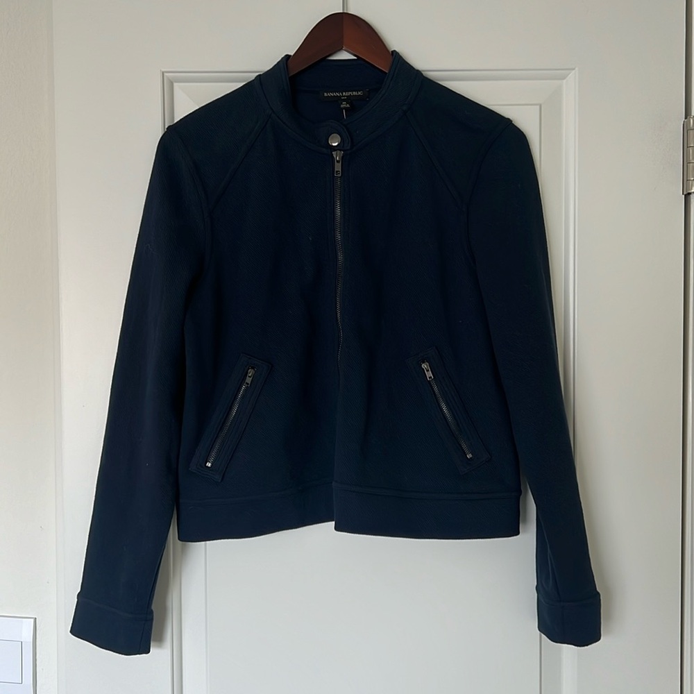 This is a Banana Republic fabric zip-up jacket